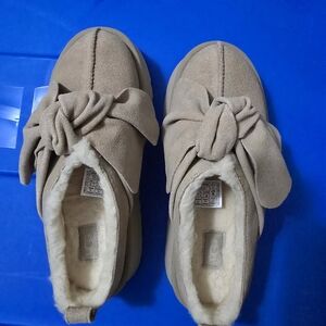 UGG Tan Bow Accent Slip-Ons